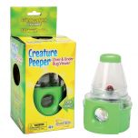 Creature Peeper in and out of the packaging. Creature Peeper Toy includes a plastic bug to get you started. Yellow and green in colour with two magnifying lenses, one at the top and one at the bottom in a periscope style.